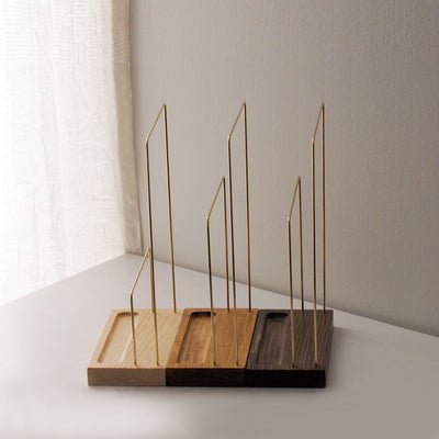 solide wood and brass jewelry stands in classical minimalism design