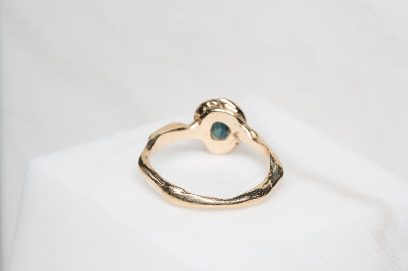 Classic Solitaire Ring with Teal Sapphire